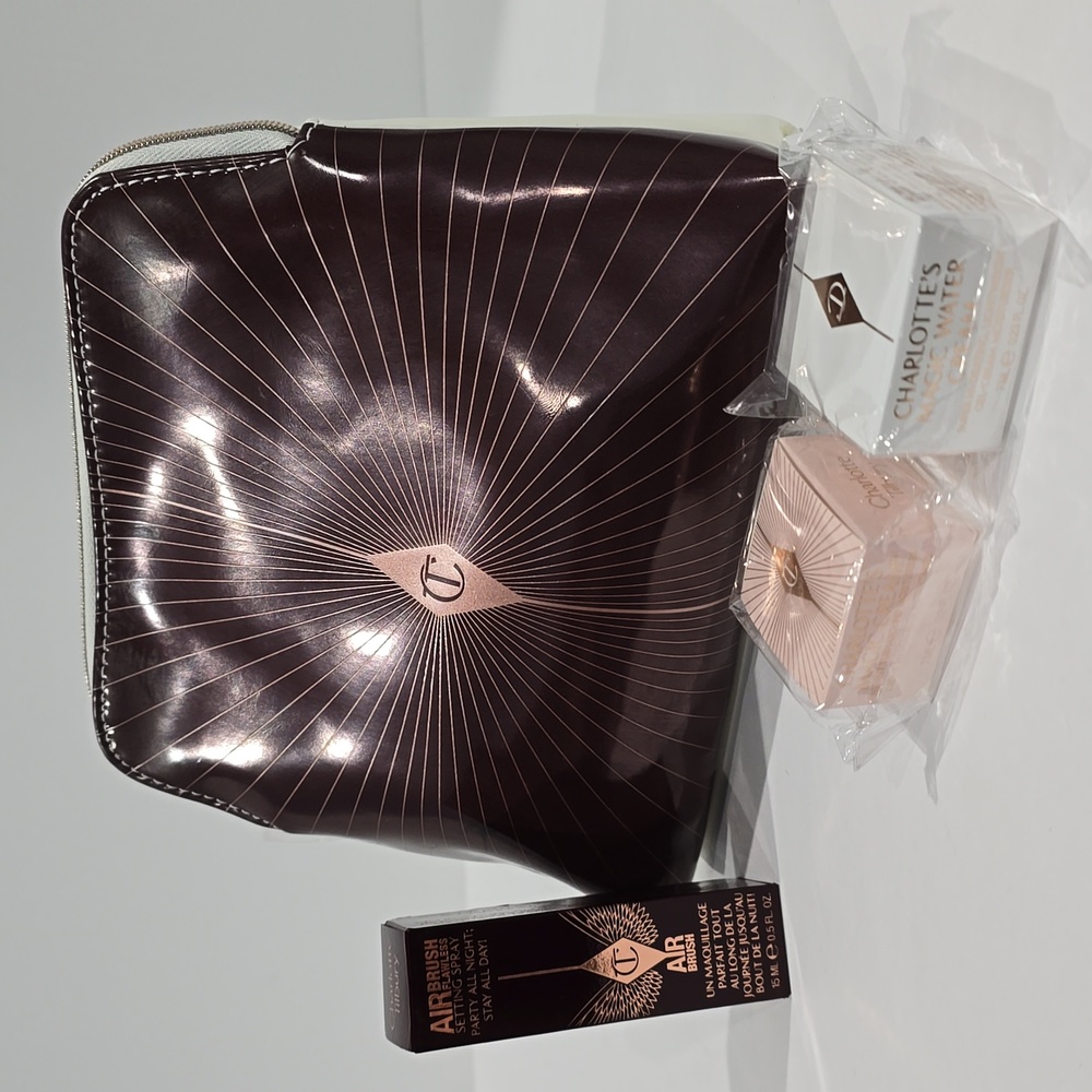 ✔️Charlotte Tilbury 4 pc Set: Makeup Bag, Spray, Magic Cream & Magic Water Cream